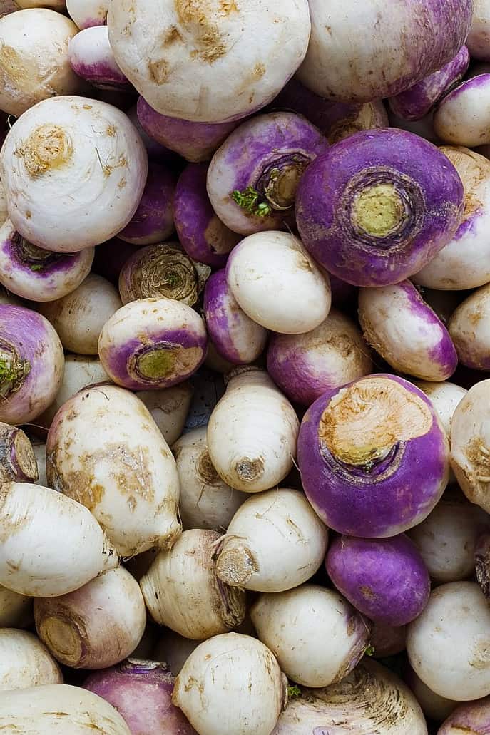 A bunch of purple top white globe turnip from above.