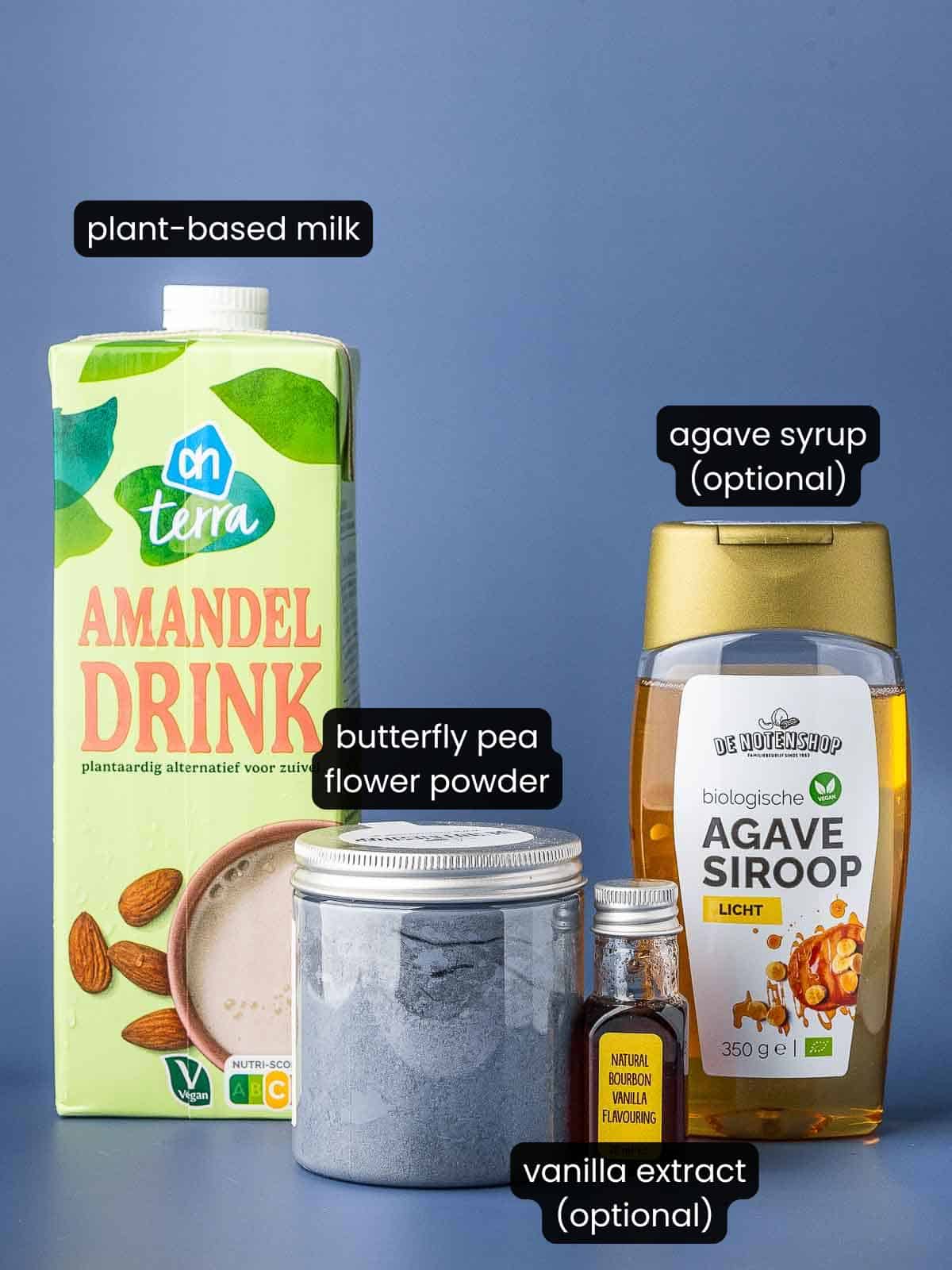 Ingredients needed to make blue butterfly pea flower latte, with labels.